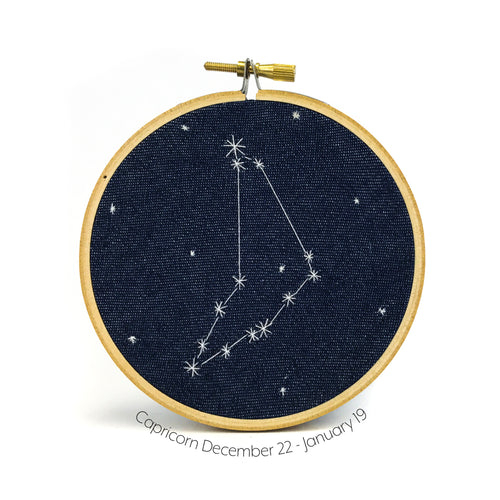 Capricorn Zodiac stitched hoop by Chelsey Greene