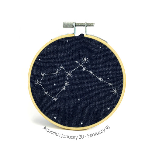 Aquarius Zodiac stitched hoop by Chelsey Greene