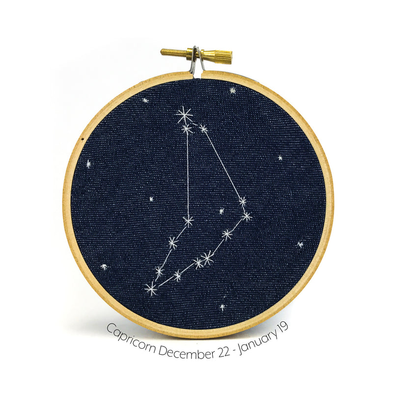 Capricorn Zodiac stitched hoop by Chelsey Greene